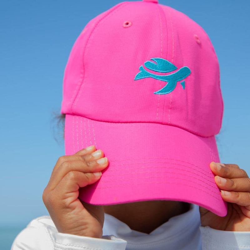 Toddler girl with Turtle Classic Kids pulled down over eyes