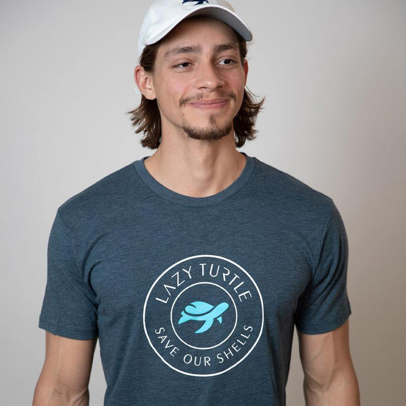 Man wearing Save Our Shells Tee